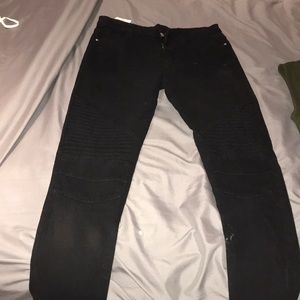 Black jeans with different textures